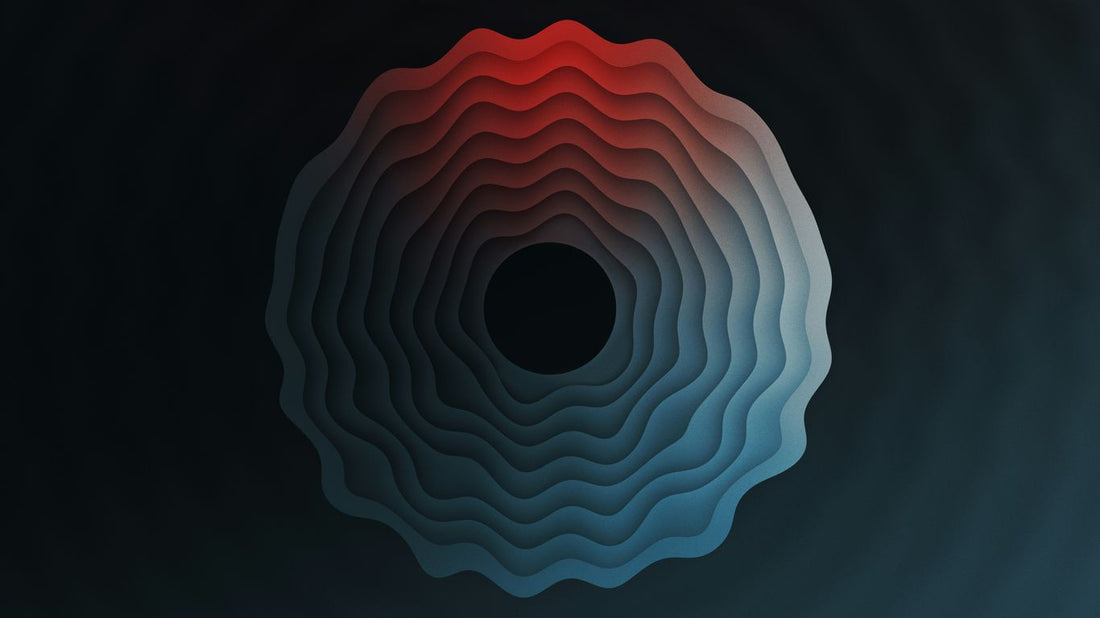 a black background with red and blue shapes