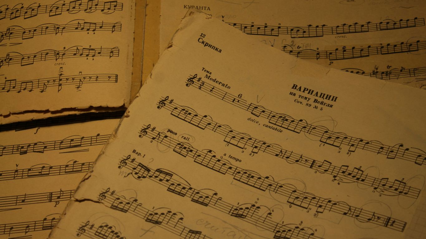 a close up of sheet music on a table