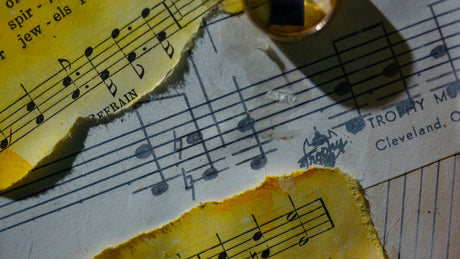 a piece of paper with musical notes on it